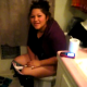A brief video clip of an Hispanic girl finishing up her poop on the toilet and in need of wiping her ass.
